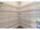 Spacious pantry with ample shelving for food storage at 174 Whaler Ave, Summerville, SC 29486