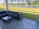 Relaxing screened porch overlooking a pond and fountain at 174 Whaler Ave, Summerville, SC 29486