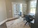 Bright home office with double French doors and view of the entryway at 174 Whaler Ave, Summerville, SC 29486