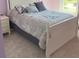 Bedroom with white bed frame and gray carpet at 174 Whaler Ave, Summerville, SC 29486