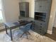 Home office with built-in cabinetry and a large desk at 174 Whaler Ave, Summerville, SC 29486