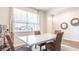 Casual dining area featuring a light gray table and rattan chairs at 150 Carolina Groves Blvd, Moncks Corner, SC 29461