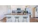 Modern kitchen with white cabinets, granite countertops and island at 150 Carolina Groves Blvd, Moncks Corner, SC 29461