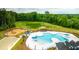 Aerial view of the community pool, playground and pond at 162 Carolina Groves Blvd, Moncks Corner, SC 29461