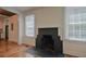 Simple, painted brick fireplace at 316 Haynes St, Walterboro, SC 29488