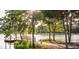 Peaceful lakefront access with a wooden dock at 102 East Morton St, Summerville, SC 29486