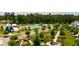 Community overview featuring pool, green spaces, and barn at 102 East Morton St, Summerville, SC 29486