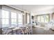 Open concept dining room and living area with hardwood floors at 102 East Morton St, Summerville, SC 29486
