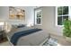 Bright bedroom with large windows and plush bedding at 102 East Morton St, Summerville, SC 29486