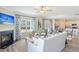 Spacious living room with fireplace, open floor plan and kitchen views at 359 Gothenburg Trl, Summerville, SC 29486