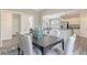 Open concept dining room with kitchen views and hardwood floors at 359 Gothenburg Trl, Summerville, SC 29486