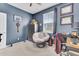 Home office with blue walls, a comfortable chair, and a workspace at 182 Greenwich Dr, Summerville, SC 29486