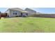 Spacious backyard with a patio and plenty of grass at 182 Greenwich Dr, Summerville, SC 29486