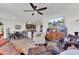 Open living room with kitchen views, hardwood floors, and comfortable seating at 182 Greenwich Dr, Summerville, SC 29486