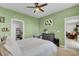Guest bedroom with green walls and built-in shelving at 182 Greenwich Dr, Summerville, SC 29486