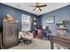 Home office features built-in shelving, a large desk, and comfortable seating at 182 Greenwich Dr, Summerville, SC 29486