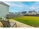 Spacious backyard with patio and fenced-in grassy area at 297 Red Leaf Blvd, Moncks Corner, SC 29461