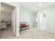 Upstairs hallway with bench seating and access to bedrooms and bath at 297 Red Leaf Blvd, Moncks Corner, SC 29461