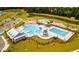 Community pool with lap lanes, playground, and clubhouse at 518 Golden Embers Way, Summerville, SC 29486