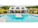 Expansive community pool with a large covered pavilion at 518 Golden Embers Way, Summerville, SC 29486