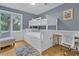 Bedroom with a bunk bed, desk, and chair at 589 Oyster Rake Dr, Kiawah Island, SC 29455