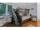 Bedroom with a bunk bed and built-in desk at 589 Oyster Rake Dr, Kiawah Island, SC 29455