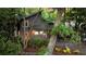 Charming house exterior with landscaping and a walkway at 589 Oyster Rake Dr, Kiawah Island, SC 29455