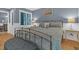 Bedroom with a metal bed frame and blue bedding at 589 Oyster Rake Dr, Kiawah Island, SC 29455