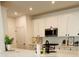Modern kitchen with white cabinets and quartz countertops at 420 Carolina Cherry Ct # 204, Charleston, SC 29414