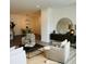 Bright and airy living room with hardwood floors, stylish furniture, and a large mirror at 420 Carolina Cherry Ct # 204, Charleston, SC 29414