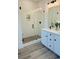 Modern bathroom with white subway tile, a large shower, and double vanity at 420 Carolina Cherry Ct # 204, Charleston, SC 29414