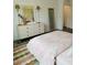 Bedroom with a full-size bed, dresser, and a large mirror at 420 Carolina Cherry Ct # 204, Charleston, SC 29414