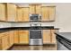 Bright kitchen featuring stainless steel appliances and light wood cabinets at 462 Eastern Isle Ave, Summerville, SC 29486