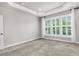 Large bedroom with neutral decor and carpet flooring at 462 Eastern Isle Ave, Summerville, SC 29486