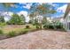 Private backyard with flagstone patio and lush landscaping at 462 Eastern Isle Ave, Summerville, SC 29486