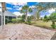 Private backyard with flagstone patio and lush landscaping at 462 Eastern Isle Ave, Summerville, SC 29486