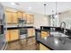 Modern kitchen with stainless steel appliances and dark countertops at 462 Eastern Isle Ave, Summerville, SC 29486