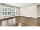 Bright living room with hardwood floors and large windows at 462 Eastern Isle Ave, Summerville, SC 29486