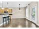 Open dining area with hardwood floors and access to the kitchen at 462 Eastern Isle Ave, Summerville, SC 29486