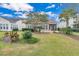 Home exterior with backyard, patio, and manicured lawn at 462 Eastern Isle Ave, Summerville, SC 29486