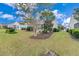 Private backyard oasis with spacious lawn and manicured landscaping at 462 Eastern Isle Ave, Summerville, SC 29486