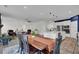 Open concept dining area with a live edge table and modern seating at 112 Whitetail Rd, Summerville, SC 29483
