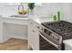 Modern kitchen with white cabinets and stainless steel appliances at 420 Carolina Cherry Ct # 202, Charleston, SC 29414