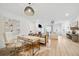 Open concept living room with hardwood floors and fireplace at 420 Carolina Cherry Ct # 202, Charleston, SC 29414