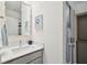 Small bathroom with single vanity, frameless shower, and decorative mirror at 420 Carolina Cherry Ct # 202, Charleston, SC 29414