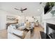 Open concept living area with hardwood floors and ceiling fan at 420 Carolina Cherry Ct # 202, Charleston, SC 29414