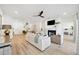 Bright and airy living room with hardwood floors and fireplace at 420 Carolina Cherry Ct # 202, Charleston, SC 29414