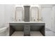 Modern bathroom with double vanity, grey cabinets, and white tile at 420 Carolina Cherry Ct # 202, Charleston, SC 29414