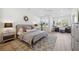 Main bedroom with sitting area, large windows and hardwood floors at 420 Carolina Cherry Ct # 202, Charleston, SC 29414