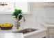 Modern kitchen sink with sleek faucet and marble countertop at 420 Carolina Cherry Ct # 202, Charleston, SC 29414